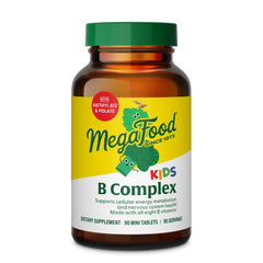 MegaFood Kids B Complex tablet on a surface, convenient on-the-go energy support.