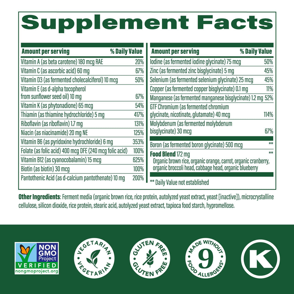 Close-up of MegaFood One Daily Iron Free tablet highlighting plant-based nutrition.