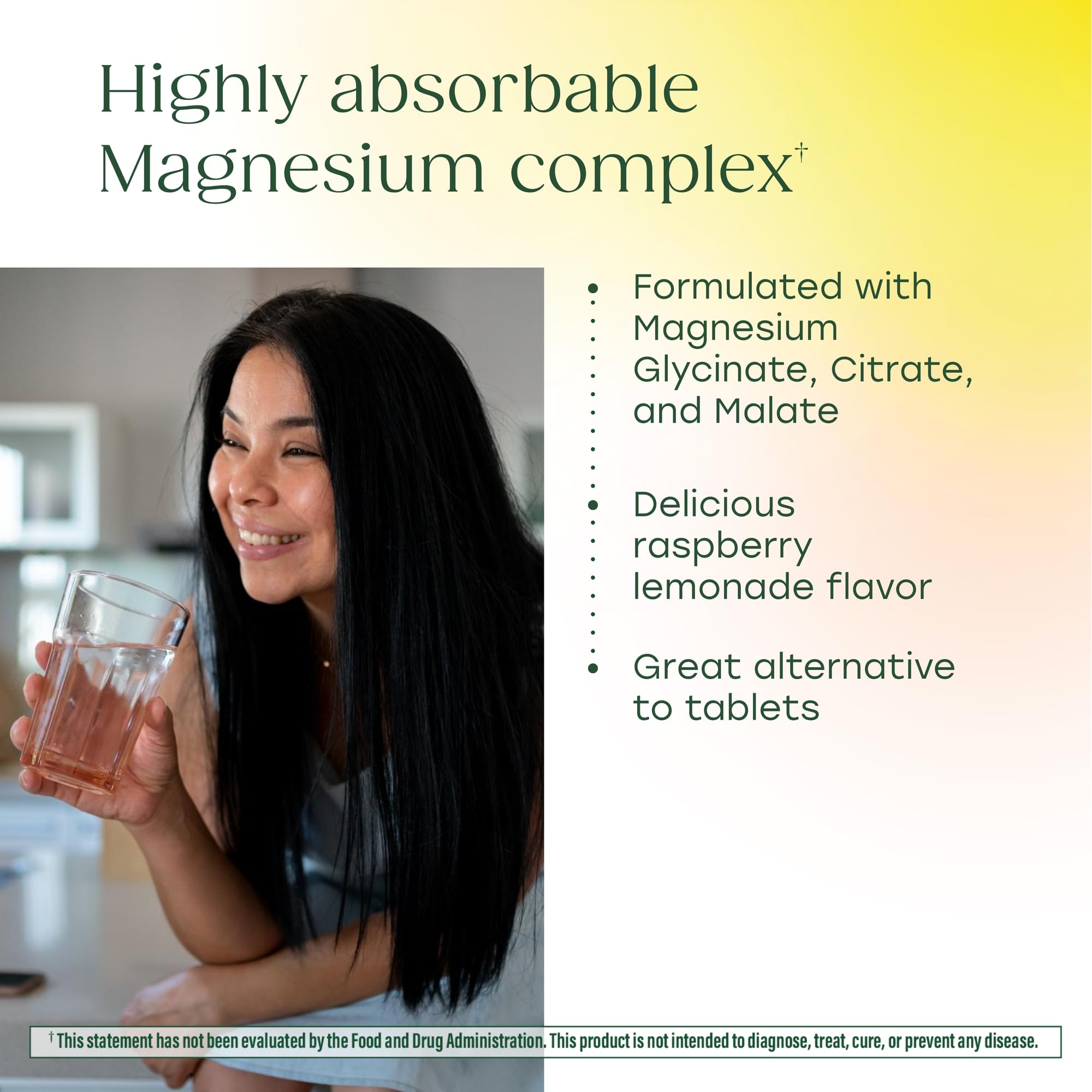 Powder dissolving in water, showing raspberry lemonade color and texture with MegaFood label.