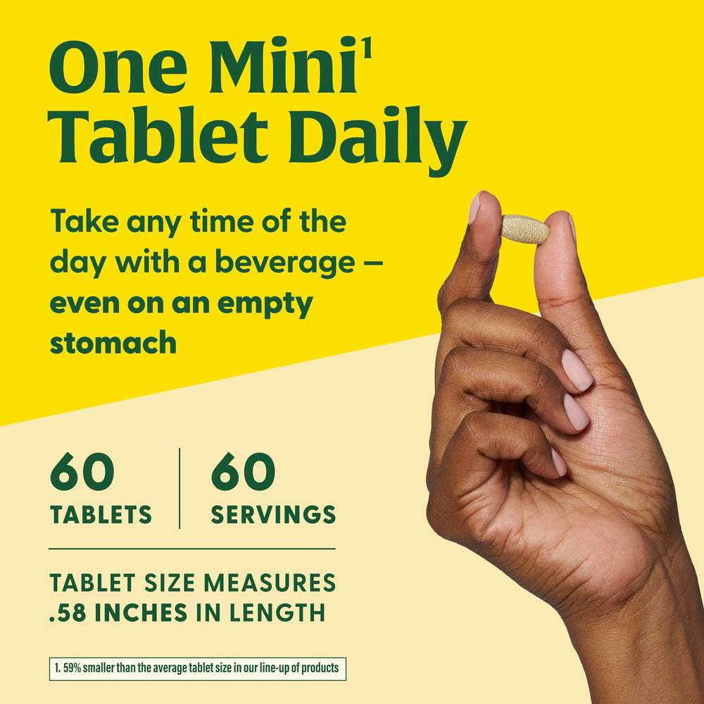 MegaFood Methyl B12 tablets with water for easy daily intake.