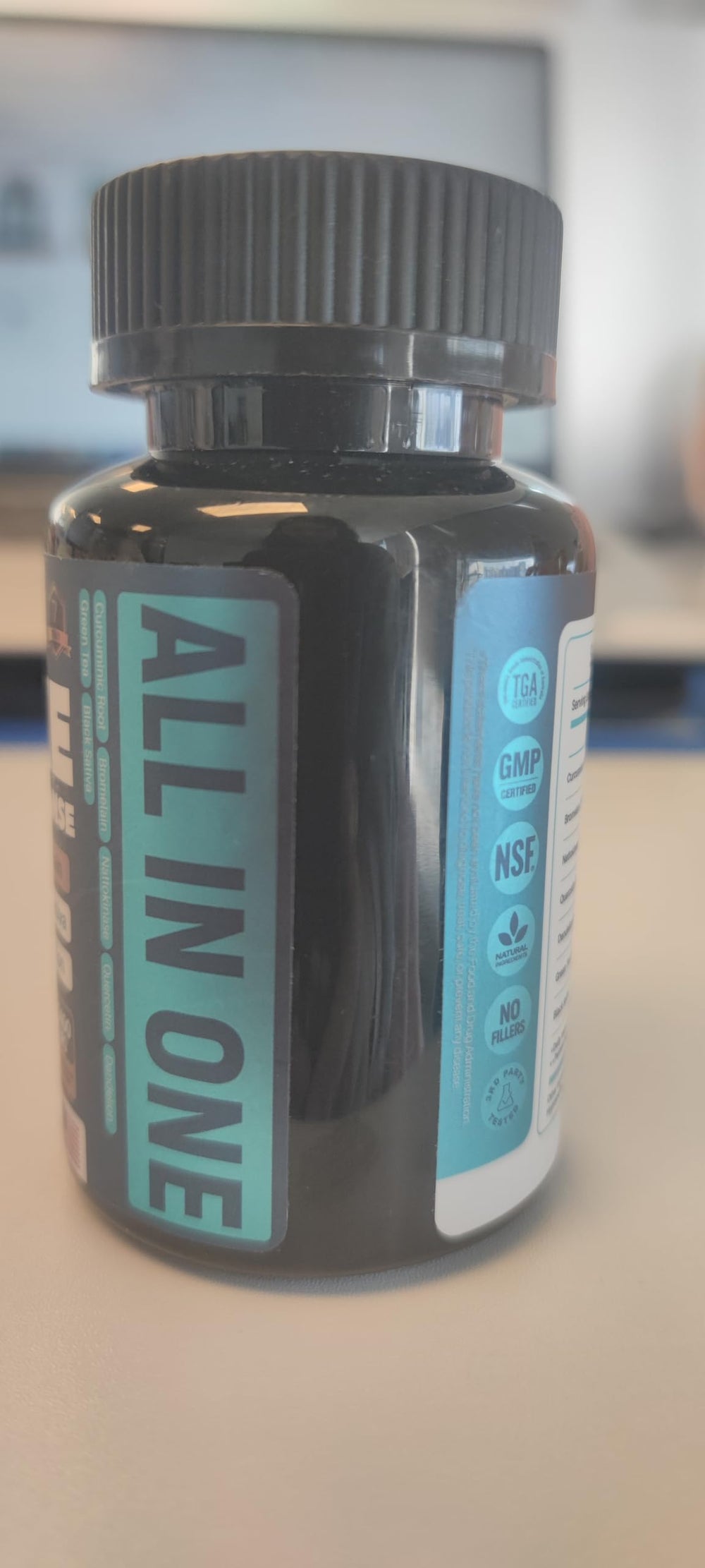 MEGNETA packaging setup—sleek bottle on a clean wellness desk.