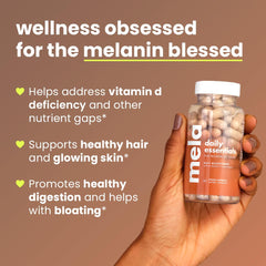 Mela Daily Essentials probiotic blend visualization; supports gut balance and skin health.