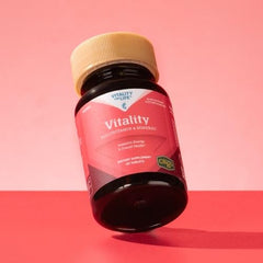 Melaleuca women's multivitamin label detail emphasizes Oligo bound minerals for absorption