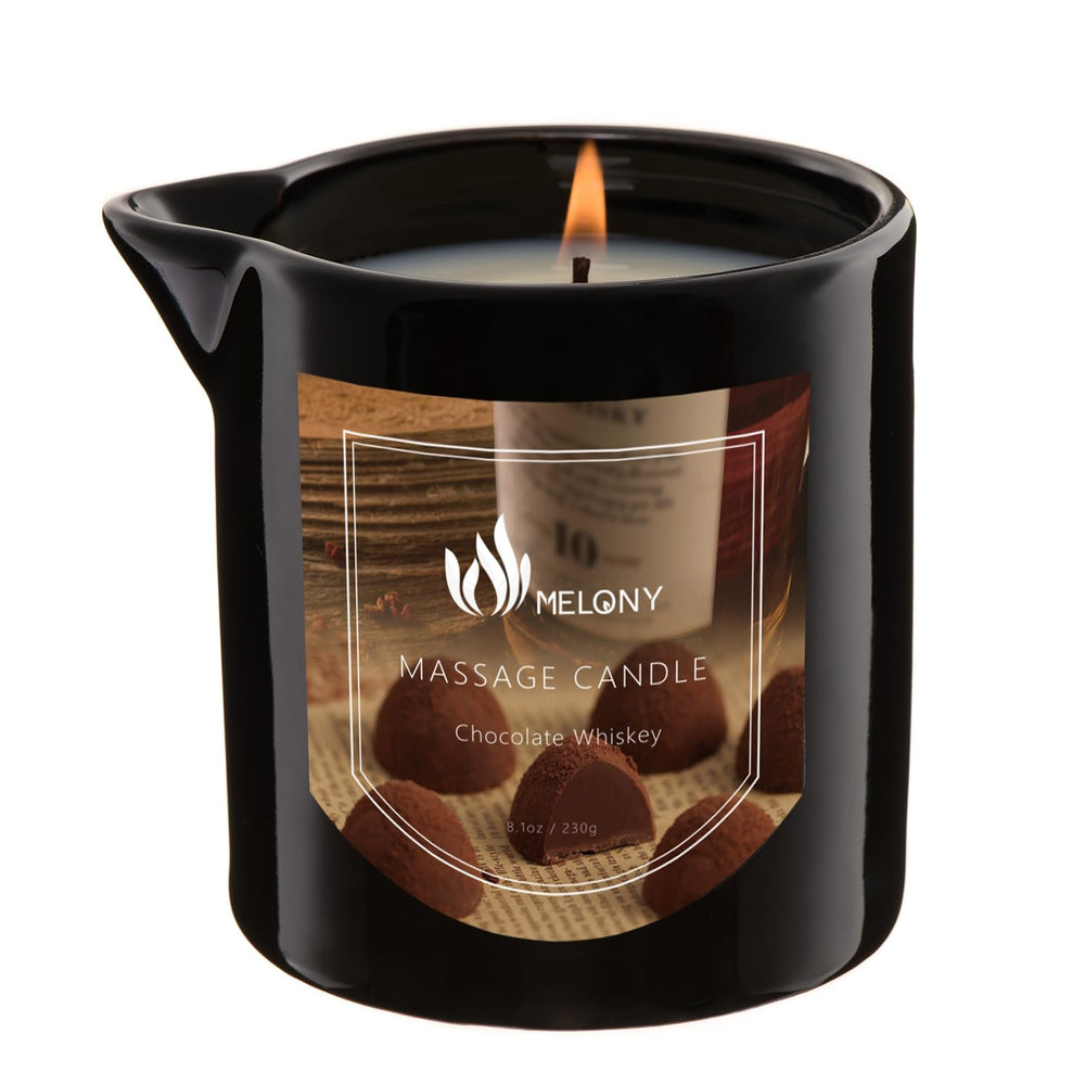 MELONY Massage Oil Candle Chocolate Whiskey lit for a warm, relaxing ambiance