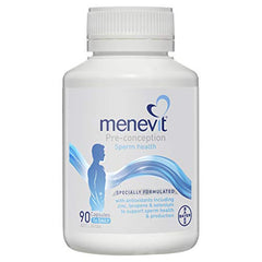 MENEVIT bottle label close-up highlighting ingredients and daily dosage.