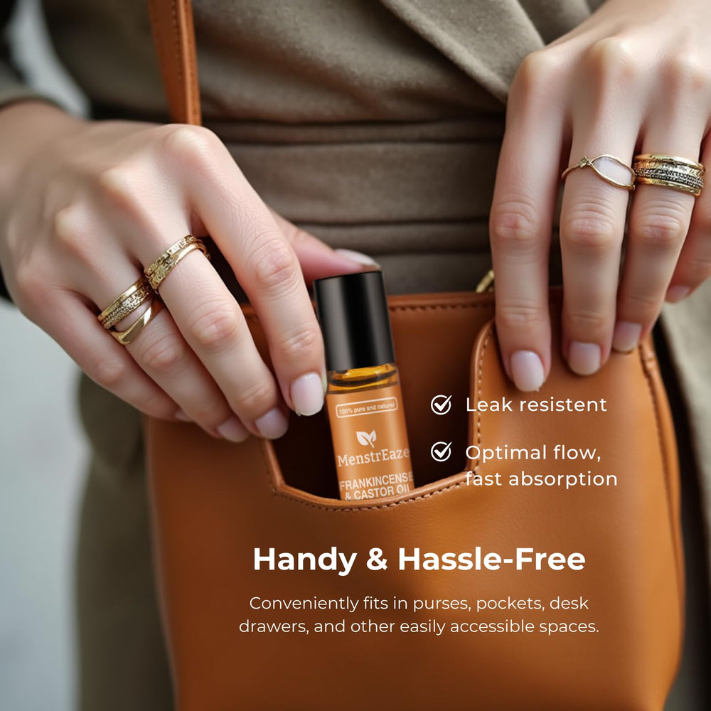 MenstrEaze compact roll-on with stainless steel cooling tip.