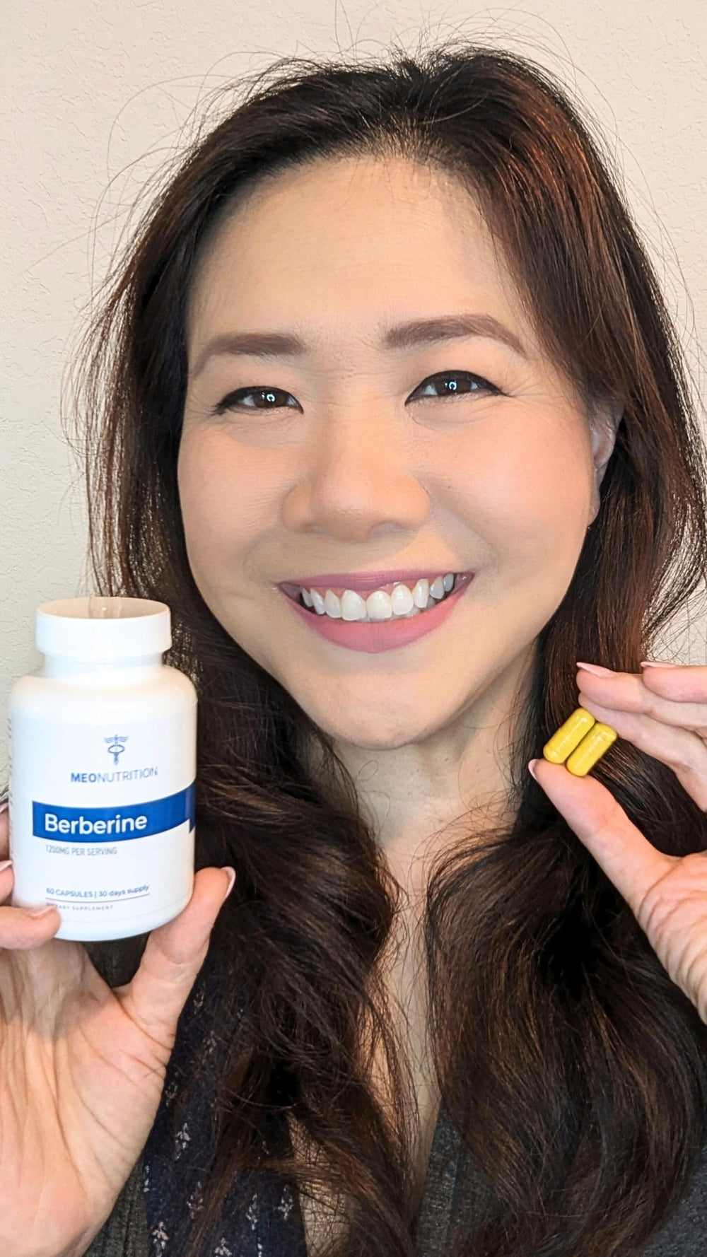 Pouring Meo Berberine capsules for easy daily dosing.