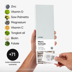 MeOrigin multivitamin men tablets close-up highlighting zinc and vitamin D.