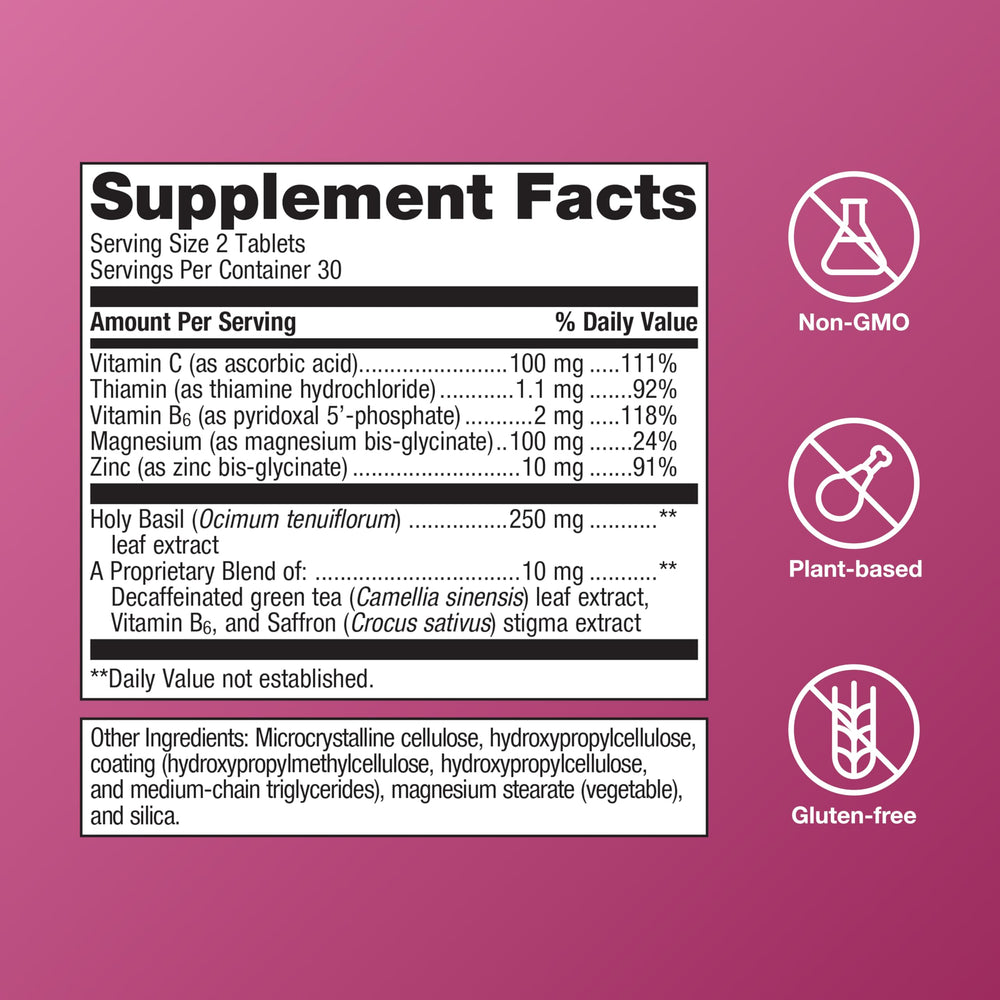 Metagenics HerWellness Recharge tablet closeup highlights chelated magnesium support.