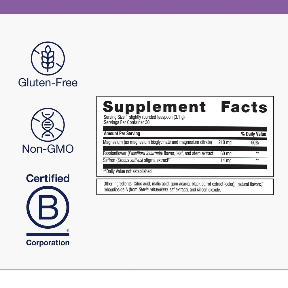 Metagenics MagActive Night Powder mixed berry glass prepared for calming sleep routine.