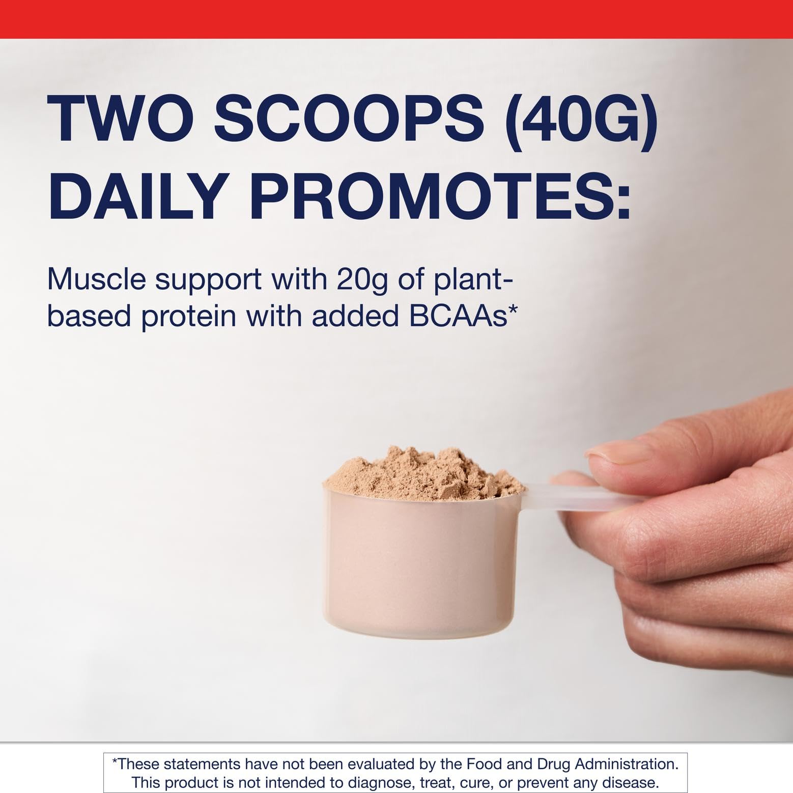 A single scoop of pea and rice protein beside a blender ready to mix.