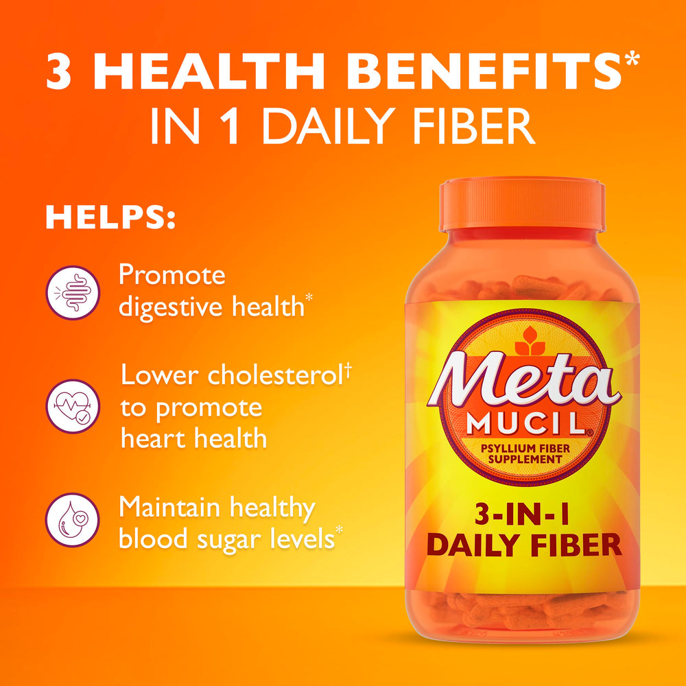 Metamucil capsules pouring into a cup.