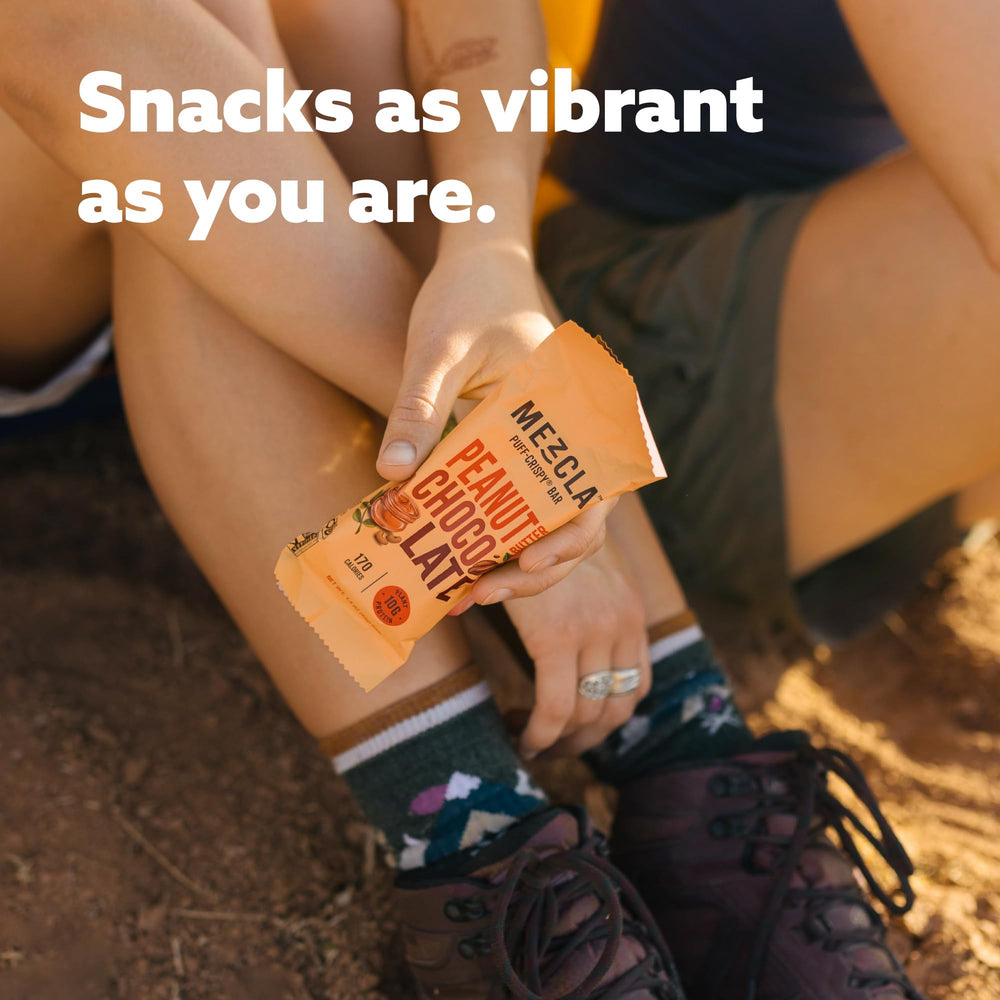 Mezcla Puff Crispy Bar slice reveals creamy center for a satisfying bite.