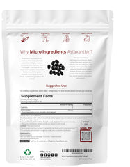 Astaxanthin softgels poured, showcasing easy-to-swallow capsules for daily use.