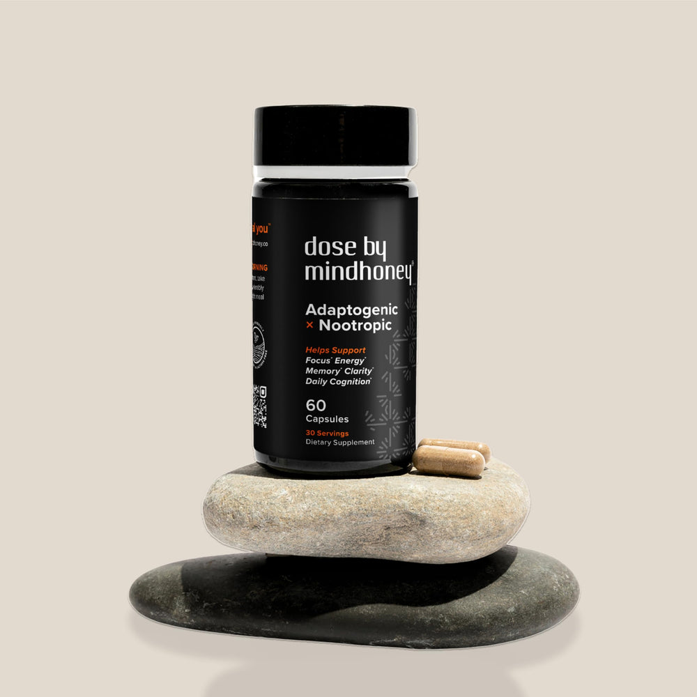 Mindhoney DOSE bottle with mushroom illustration signaling natural synergy for focus.