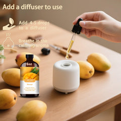 Mlynkl Mango diffuser setup releasing tropical aroma in a room.