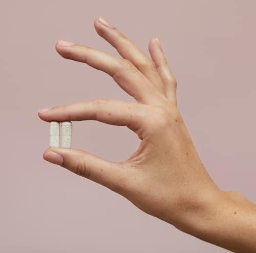 Modern Fertility Prenatal Multivitamin capsules close-up showing small, easy-to-swallow pills