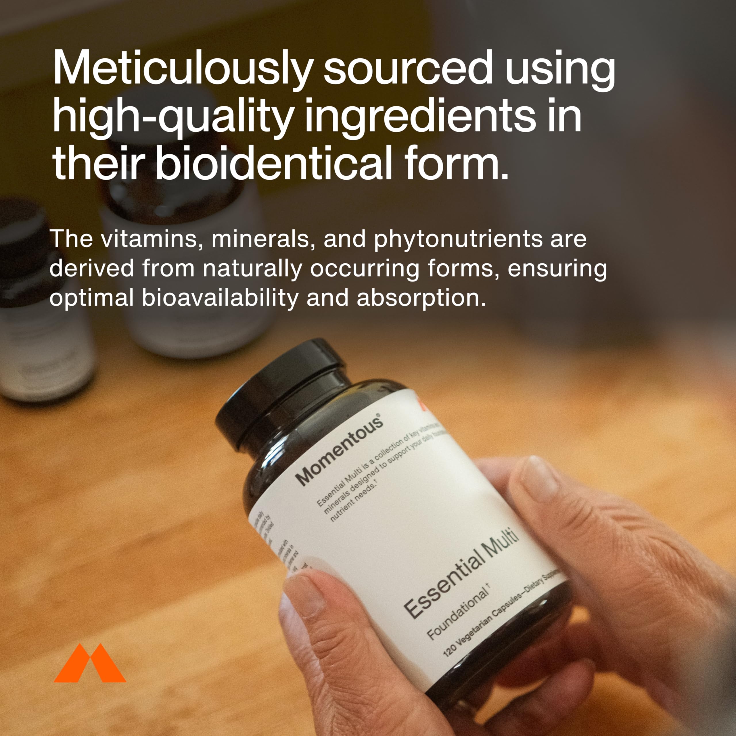 Momentous Essential Multivitamin label detail shows vitamin and mineral balance.