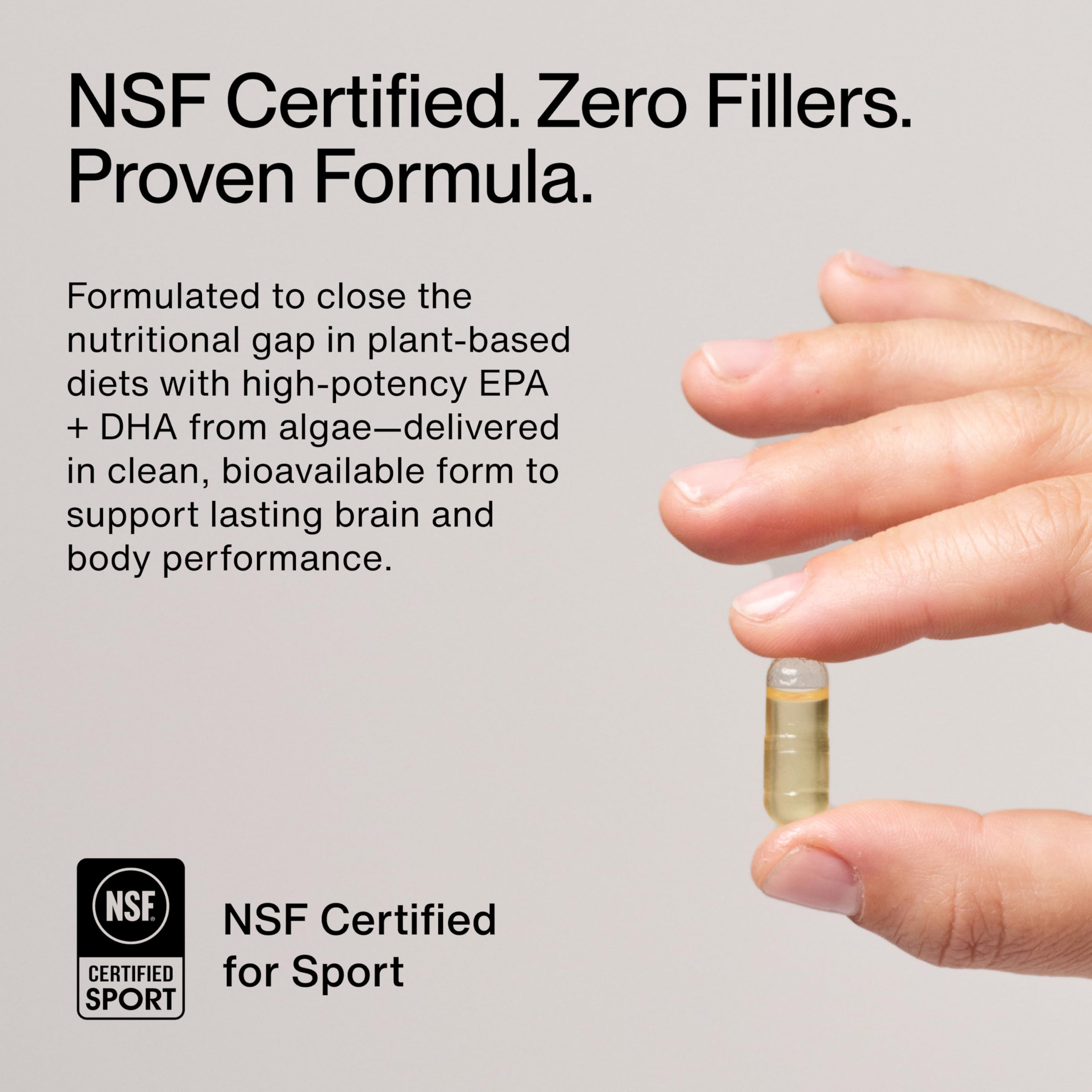 Momentous Vegan Omega-3 closeup of capsules emphasizes clean, plant-based nutrition.