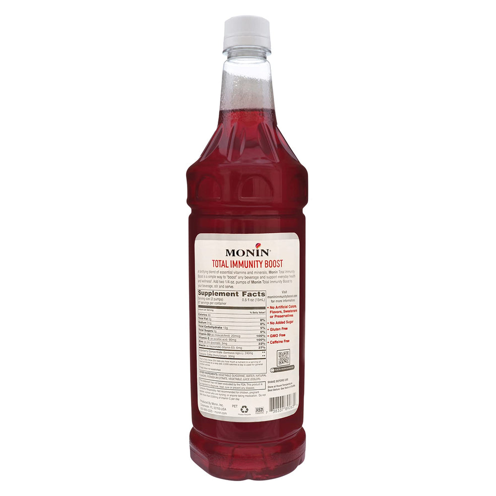 Monin Total Immunity Boost label close-up highlighting sustainable packaging.
