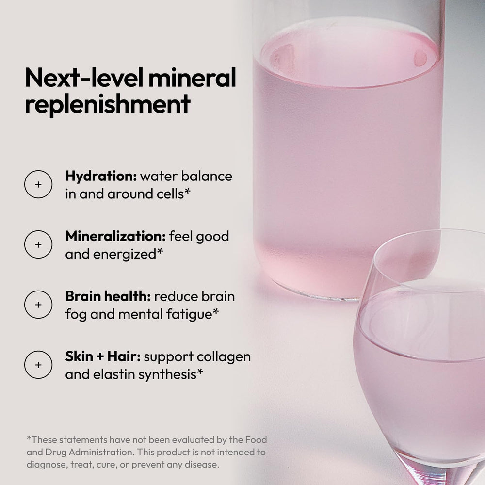 Moon Juice Mini Dew dissolving in water to provide quick hydration with minerals.