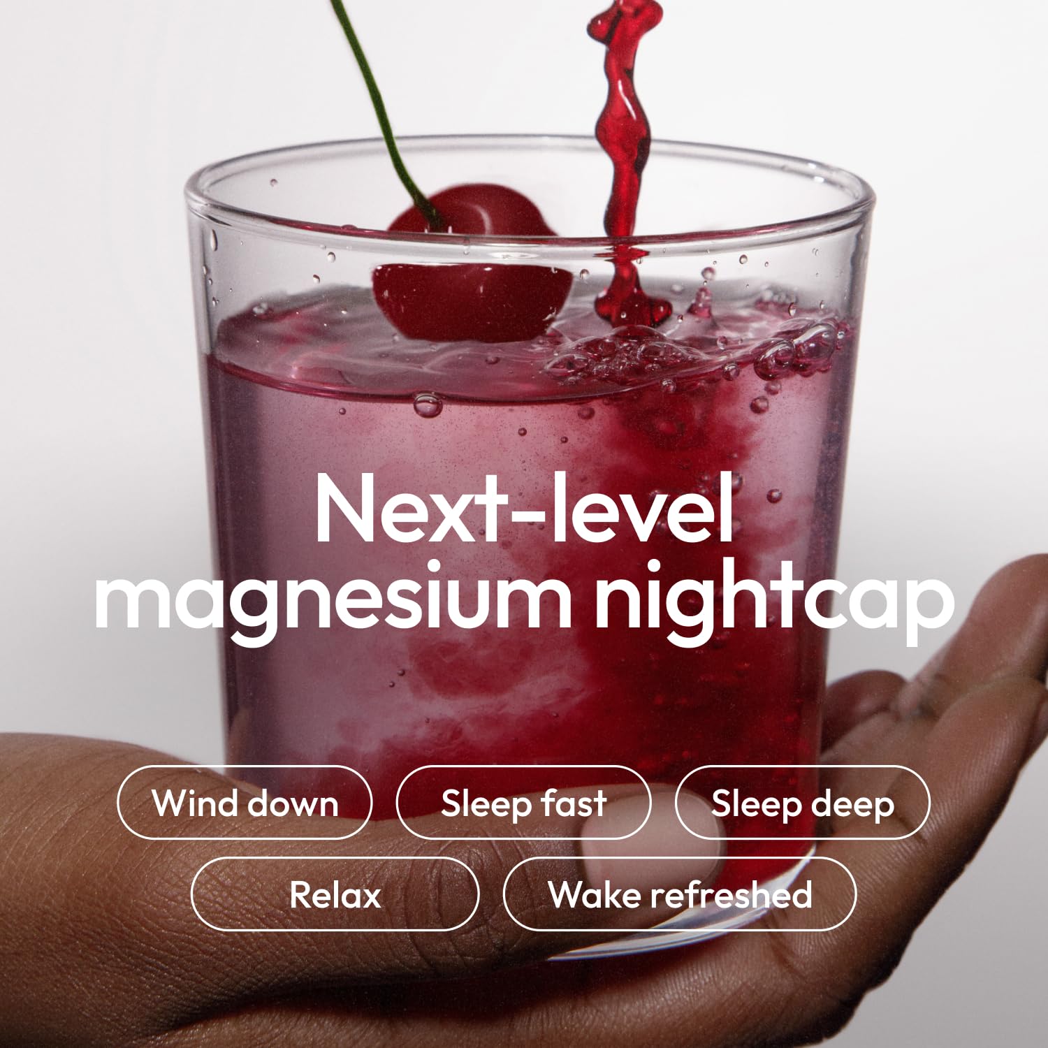 Moon Juice Sleepy Magnesi-Om powder dissolving in water for restful nights.