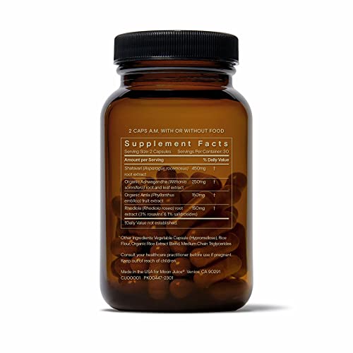 Moon Juice SuperYou bottle on a desk with laptop, for mood and energy support.
