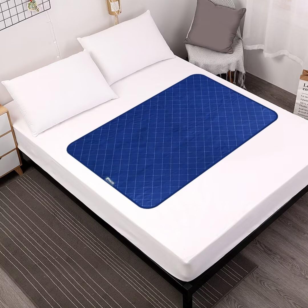 Moonsea waterproof mattress pad 34x52 top view in navy protects beds while staying in place.
