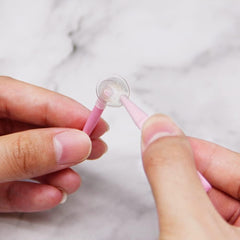 MortTime soft-tip tweezer for gentle, precise lens handling.