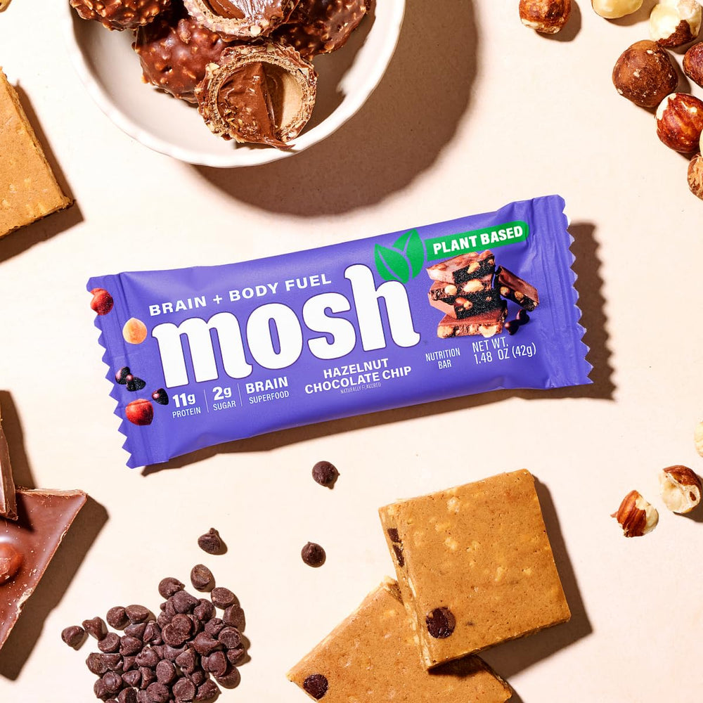 MOSH bar beside glass of water suggests balanced brain-friendly snacking