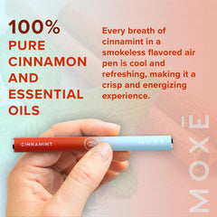 MOXE cinnamint inhaler sleek, pocket-size device held in hand for on-the-go use.