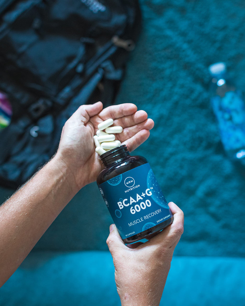 MRM athlete during workout using BCAA+ for endurance and recovery