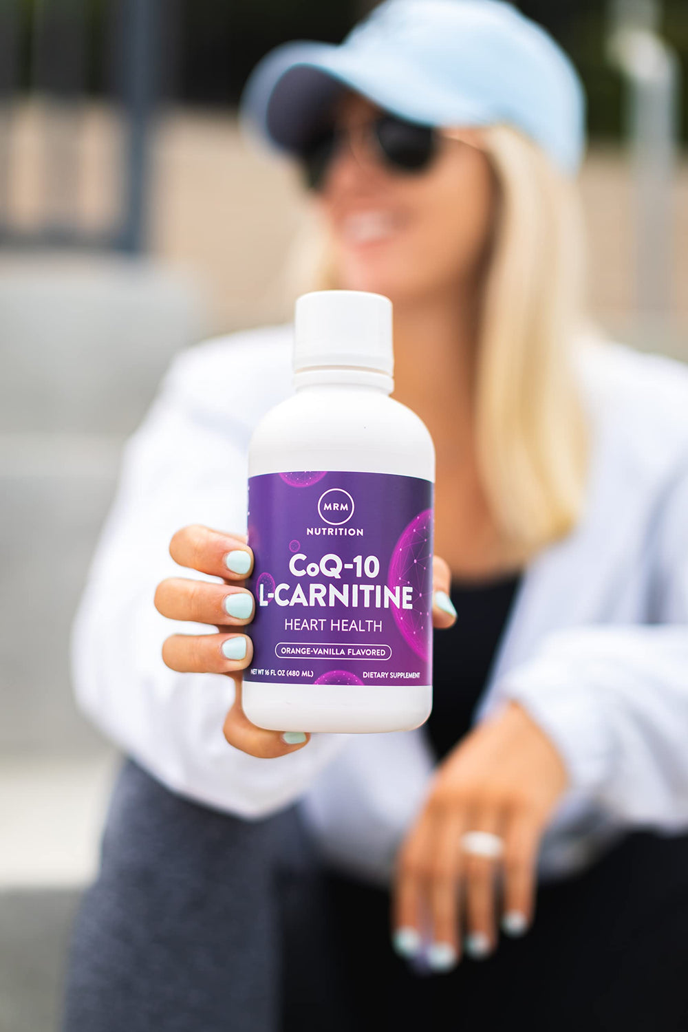 MRM CoQ-10 L-Carnitine serving spoon emphasizes accurate daily servings.