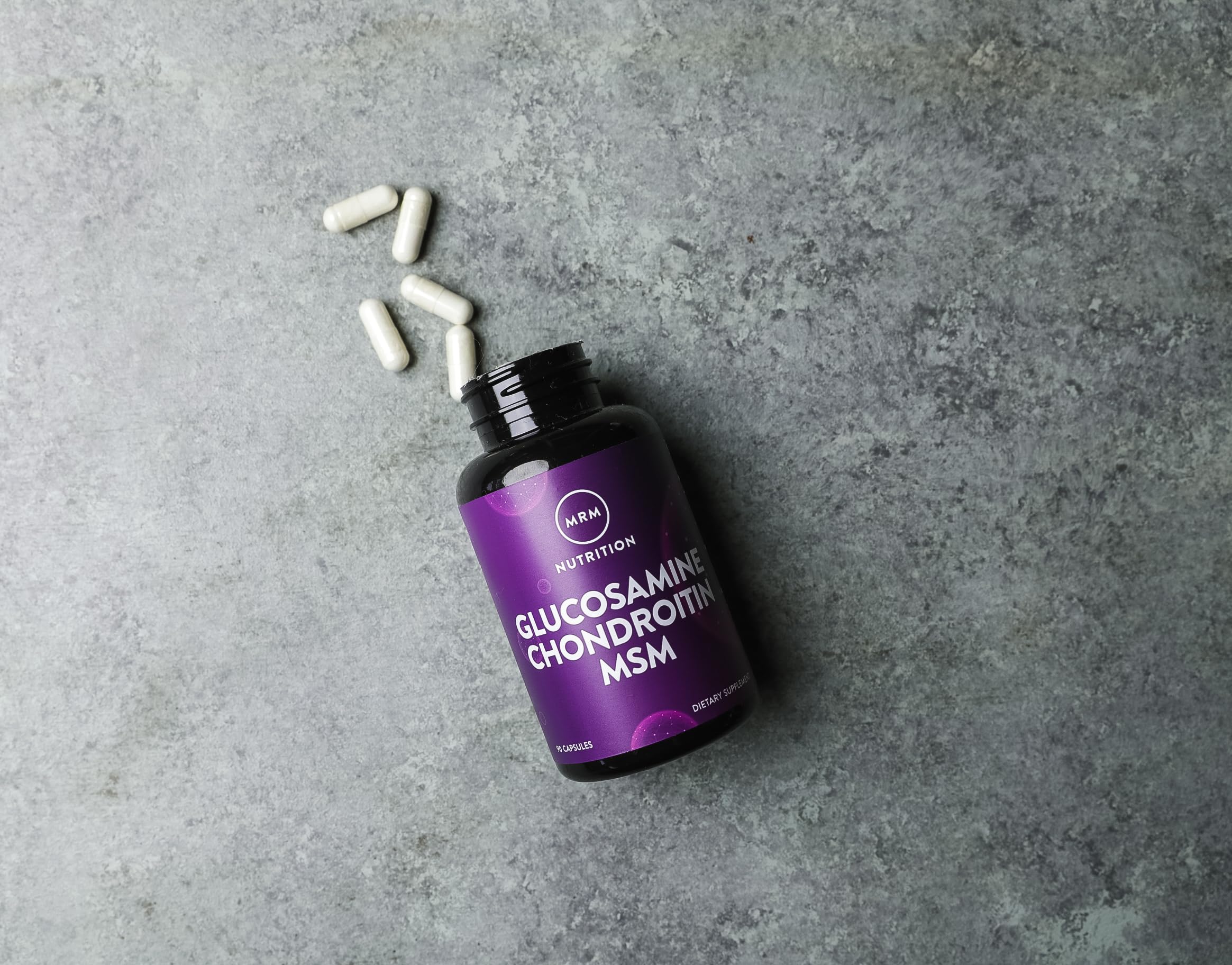 MRM bottle on countertop with dosage tray for easy intake