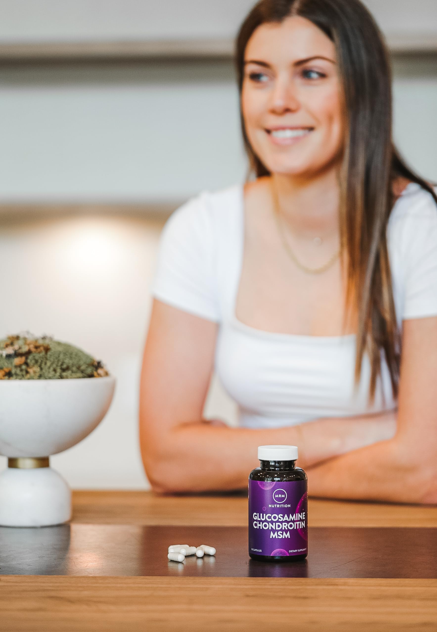 MRM wellness setup with capsules aligned for daily use