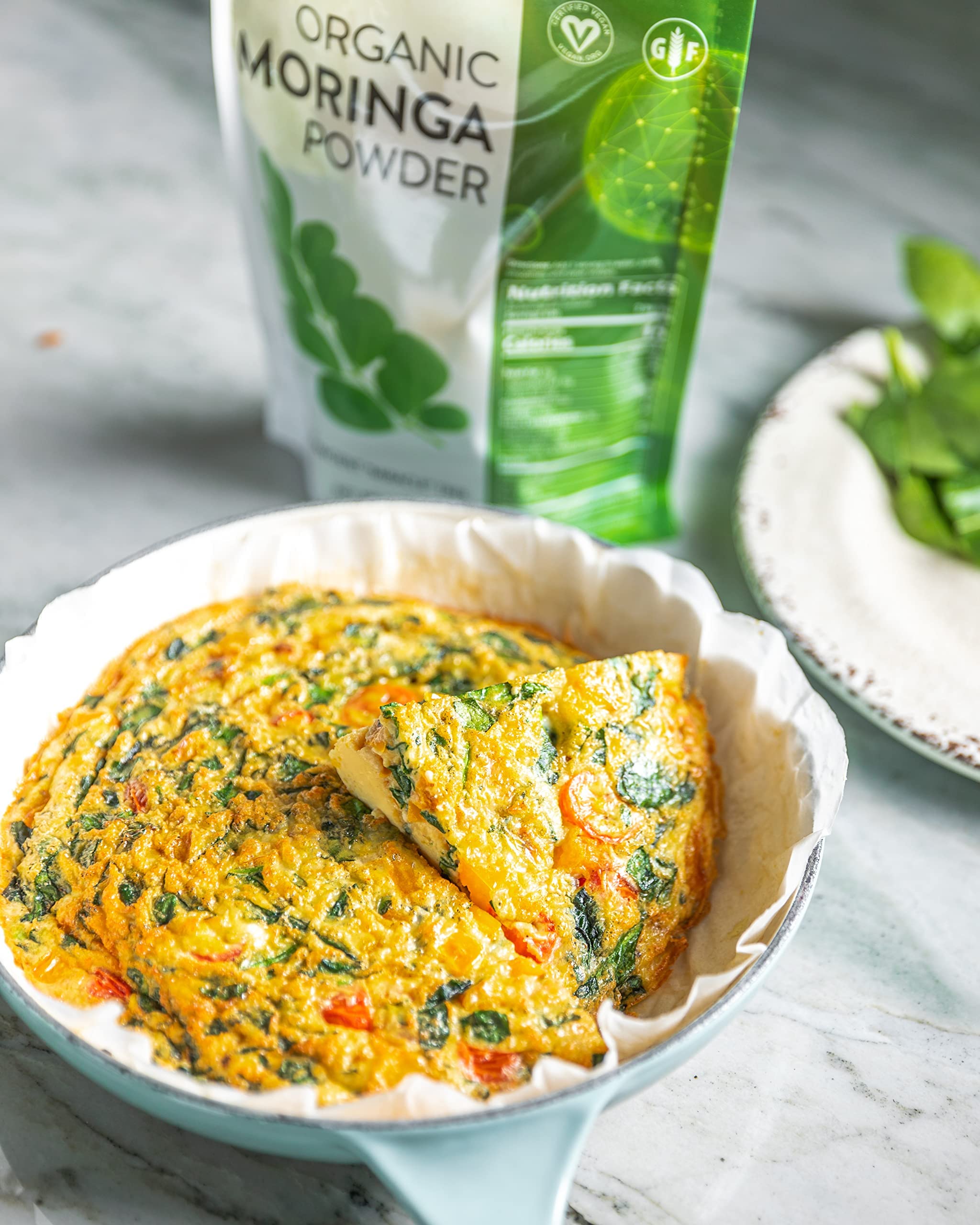 MRM Moringa powder on kitchen counter ready for a healthy greens boost