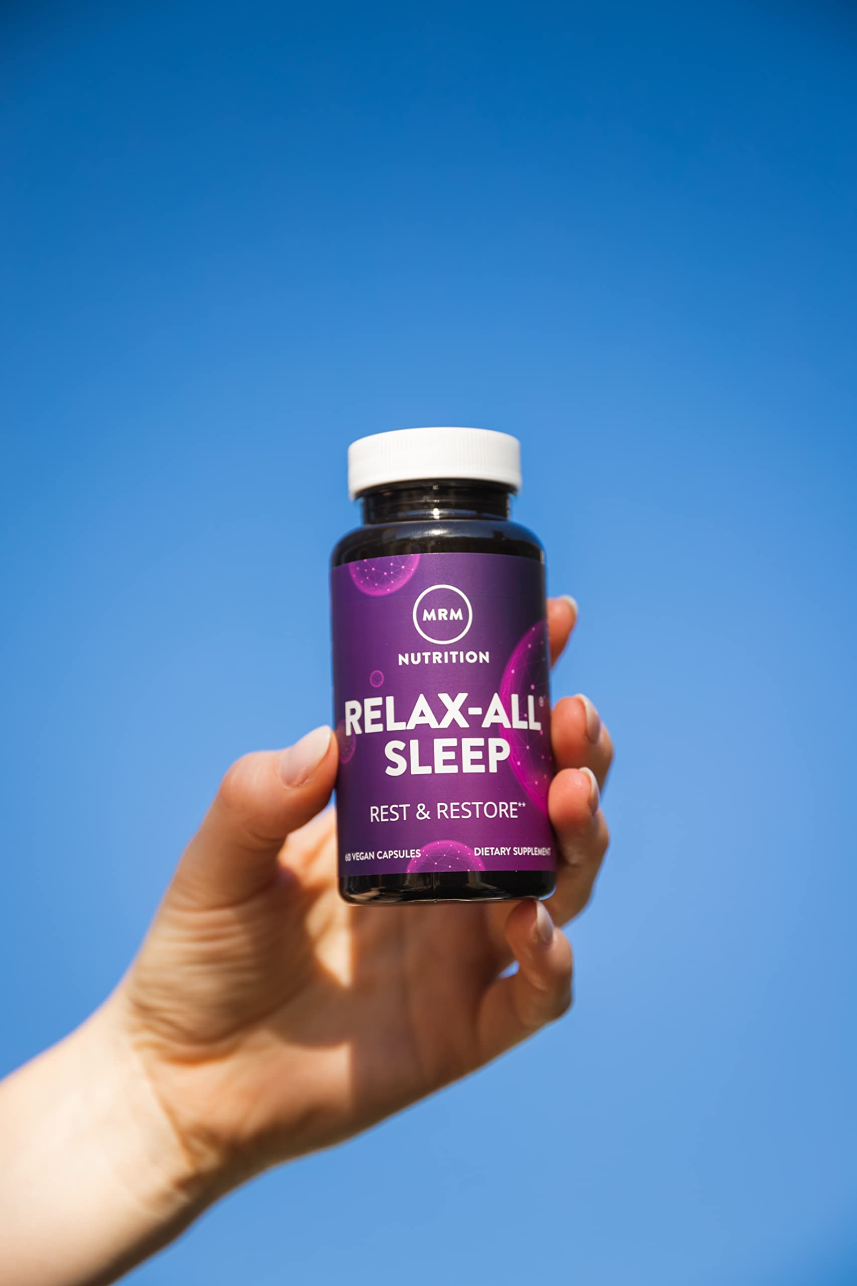 MRM Relax-All Sleep on nightstand beside bedtime routine items