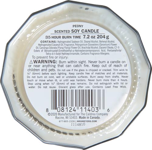 Mrs. Meyer's Clean Day candle glow adds cozy ambiance.