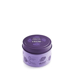 Label closeup shows essential oils and plant-derived wax for a clean burn