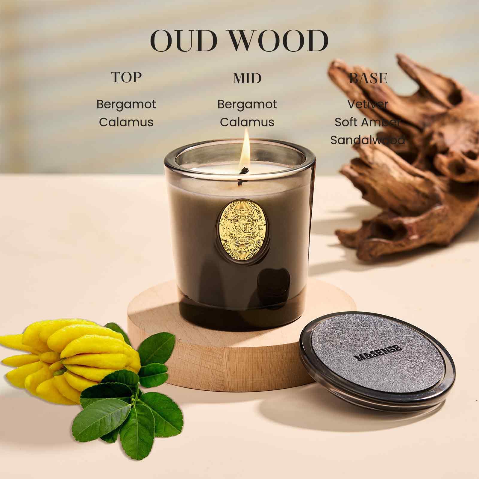 M&SENSE Oud Wood & Black candle on a shelf adds subtle decorative elegance