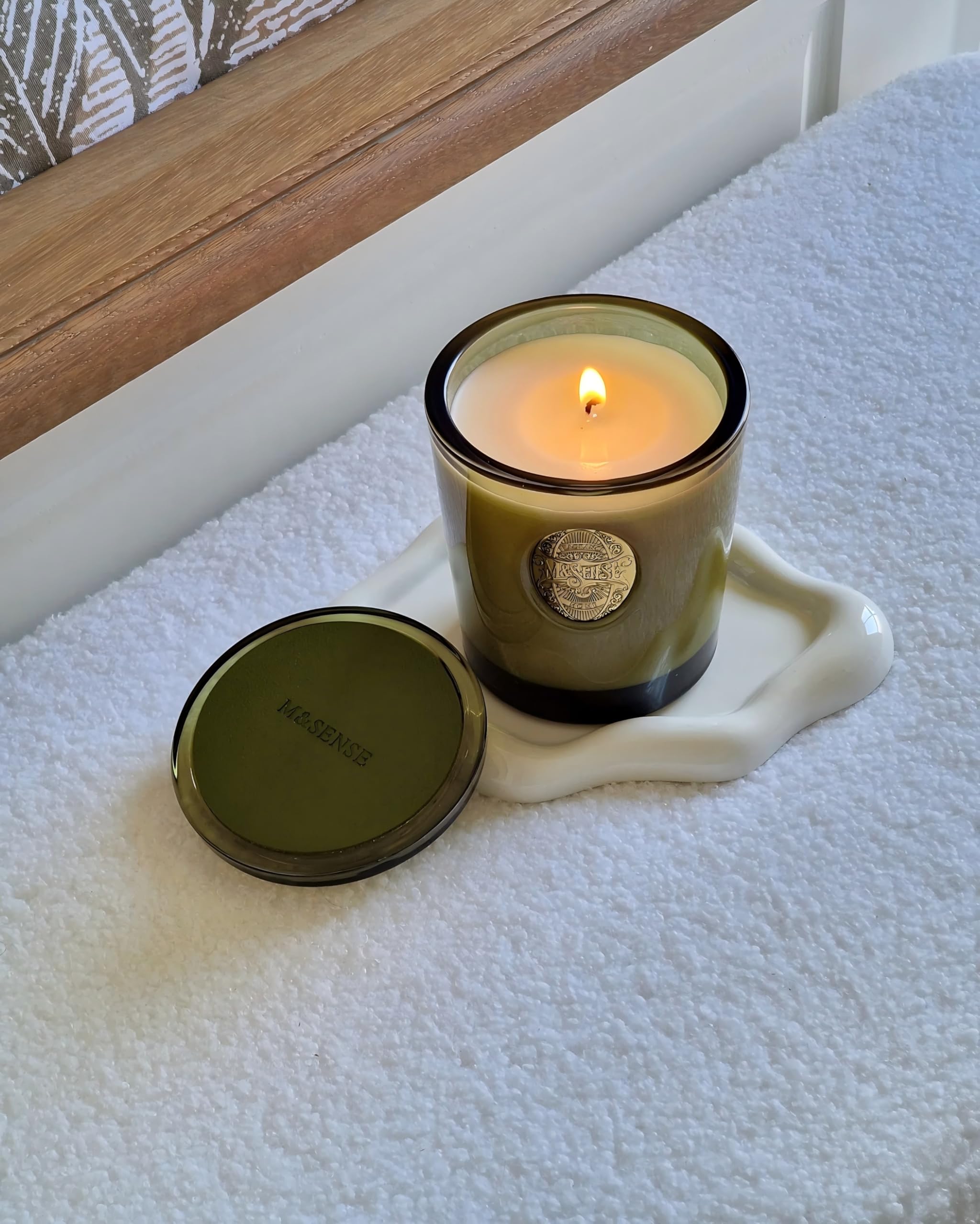 M&SENSE candle on an office desk for focused relaxation