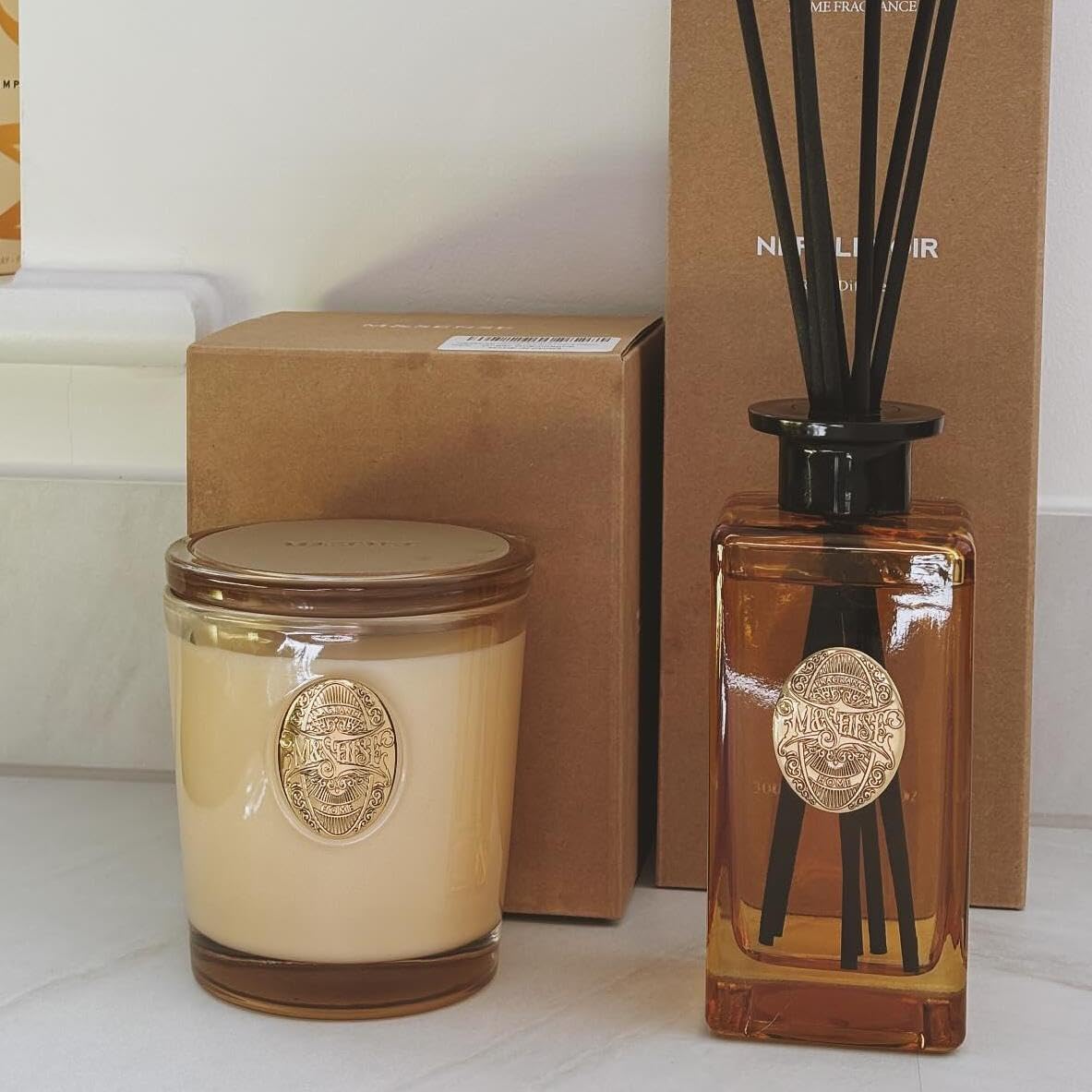 M SENSE Office candle on desk creates a focused, soothing mood.
