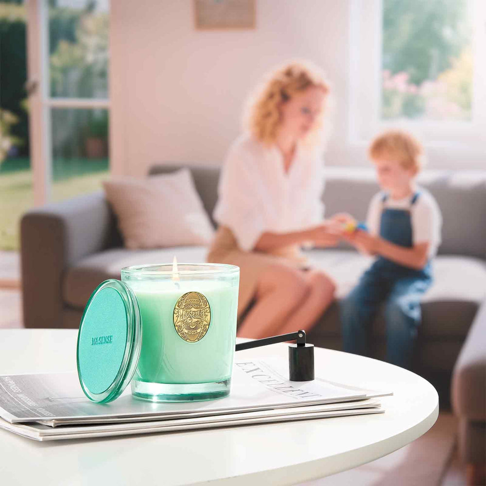MSENSE candle lit during yoga practice for relaxation.