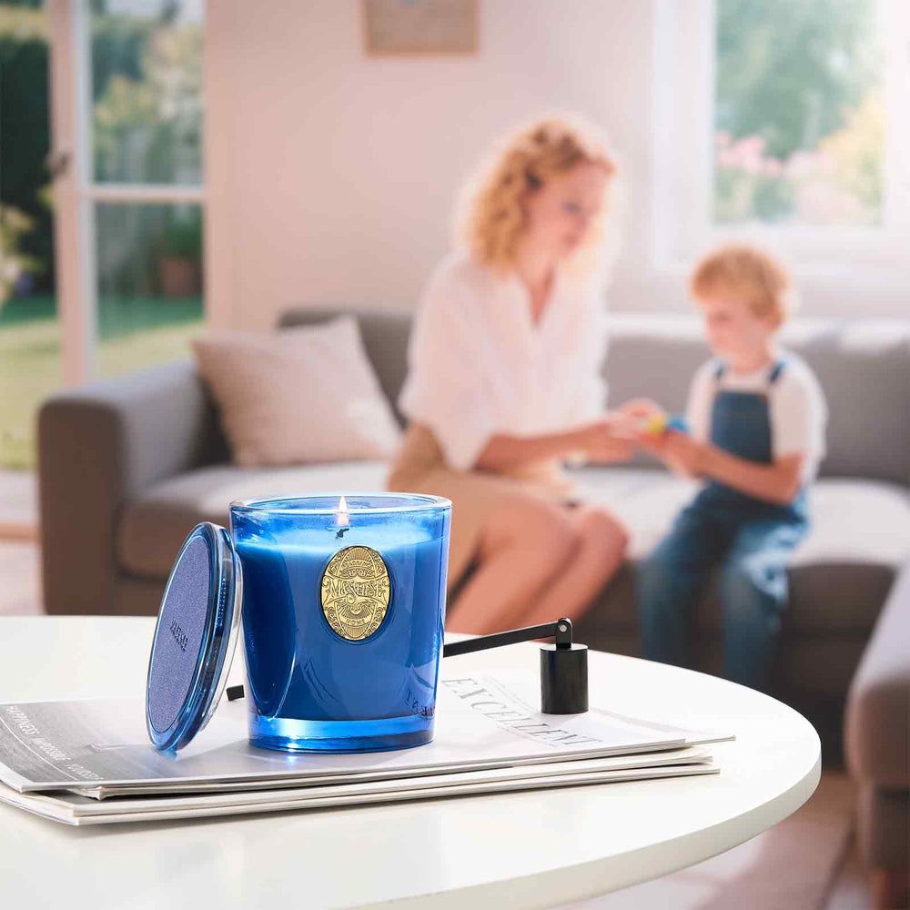 M&SENSE candle in a cozy office setting creating focused atmosphere.