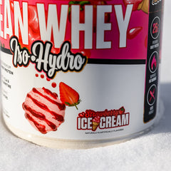 Musclesport Lean Whey Revolution scoop in jar emphasizes convenient, on-the-go protein for lean gains.