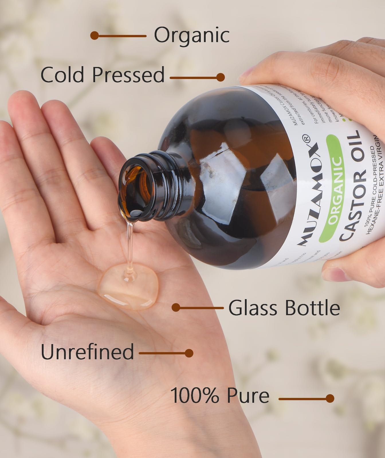 MUZAMOX organic castor oil bottle highlights premium cold-pressed formula.