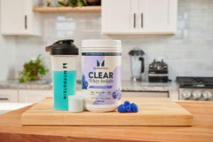 Blue raspberry label highlights natural flavor and zero sugar option.