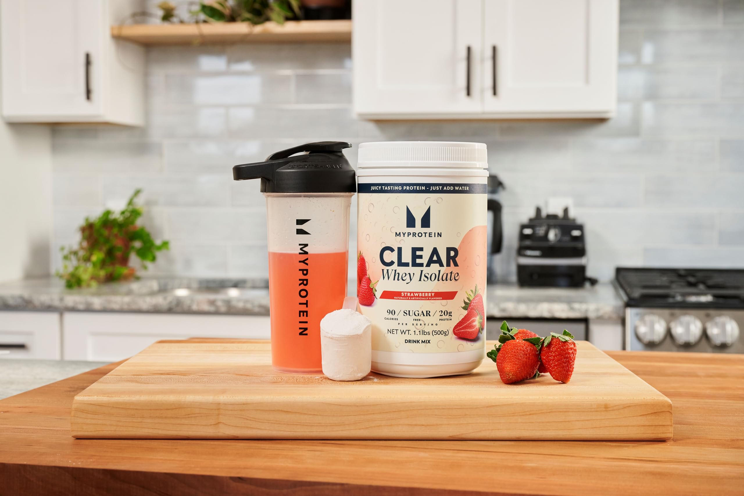 Myprotein Clear Whey Isolate Powder scoop captures convenient protein delivery for workouts