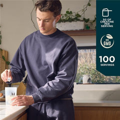 Myprotein Creatine Monohydrate scoop beside tub for quick daily use.