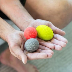 NABOSO textured-ball closeup highlights sensory texture aiding neural activation during therapy.